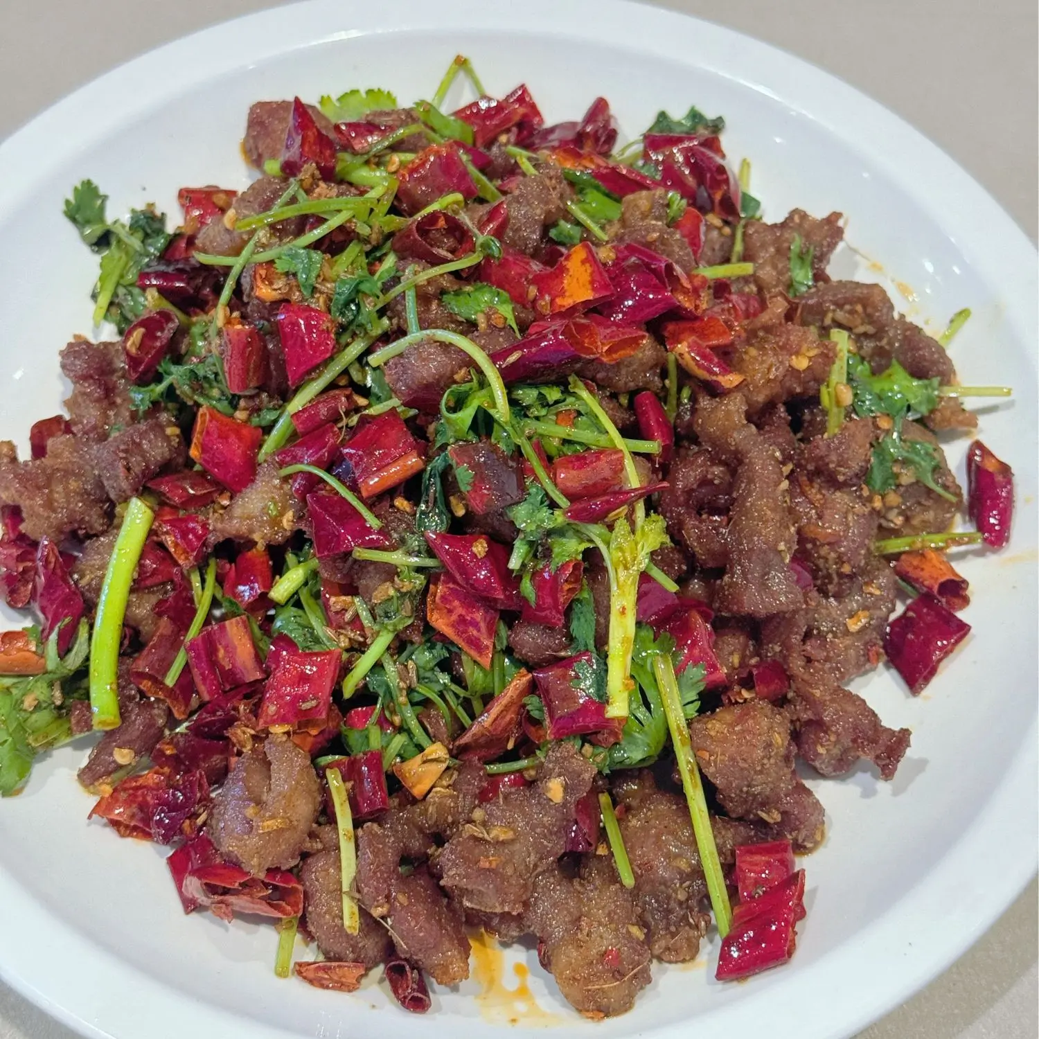 Tender lamb stir - fried with chili and cilantro at Spices Garden, a Chines Sichuan Restaurant in Fremont
