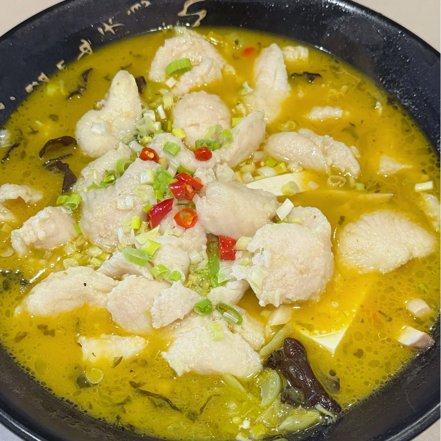 Fish fillets in sour pickled cabbage broth at Spices Garden, a Chines Sichuan Restaurant in Fremont